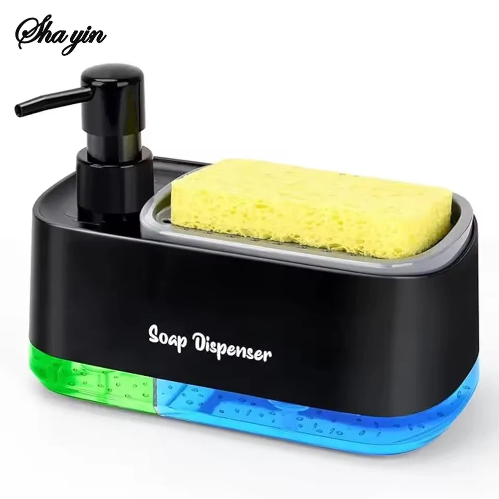 Black plastic kitchen soap dispenser set with dual clear compartments and integrated yellow sponge on holder tray