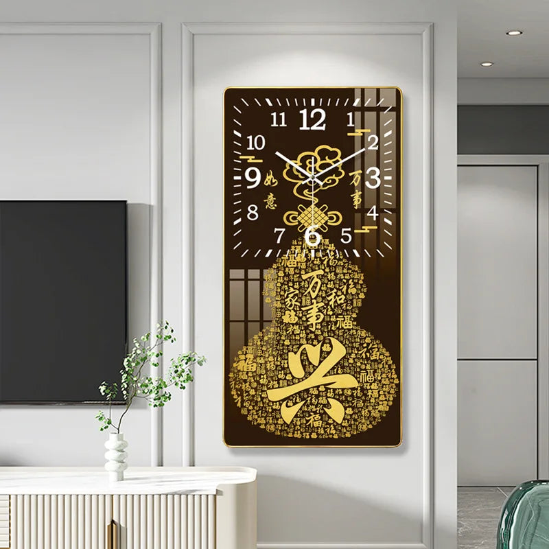 Rectangular wall clock featuring gold calligraphy and symbols, mounted in a light-toned modern home interior