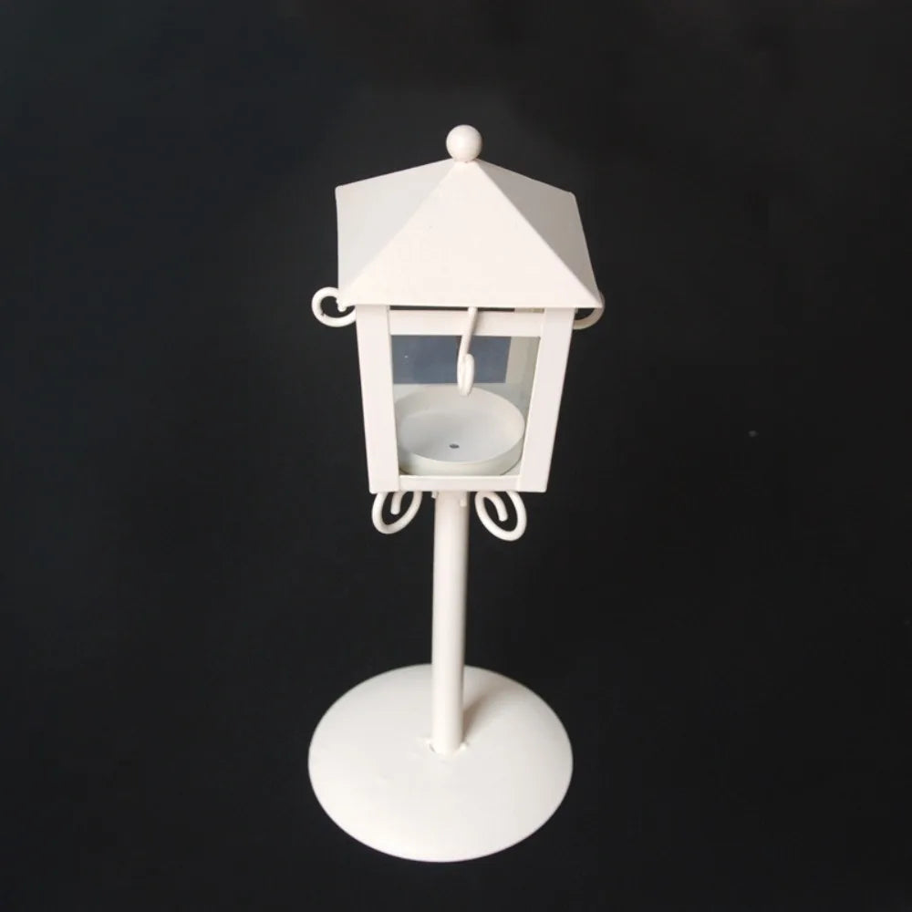 White lantern candle holder viewed from above against a dark background