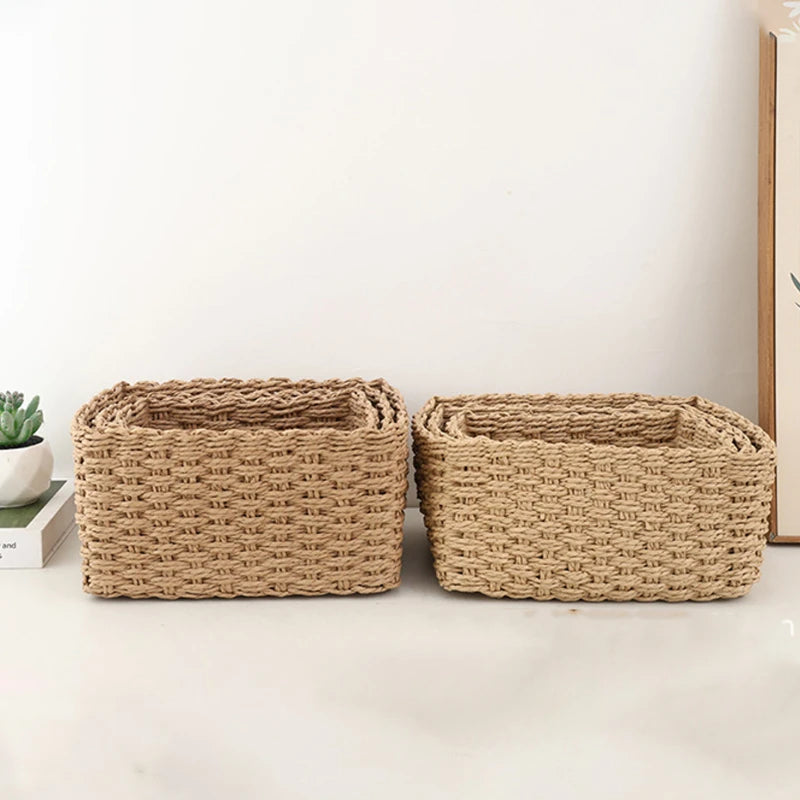 Two sets of beige handwoven storage baskets stacked side by side on a shelf