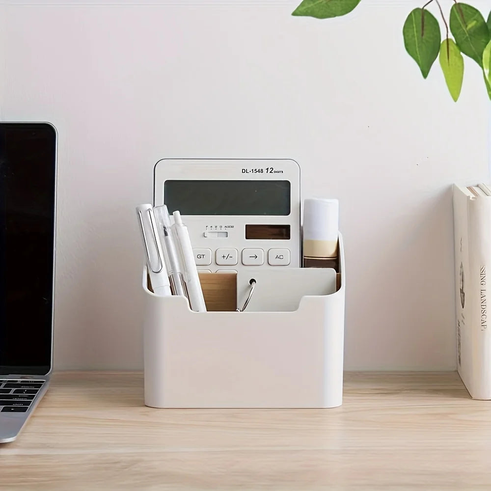 Remote control organizer caddy used for desk supplies and calculator on a workspace