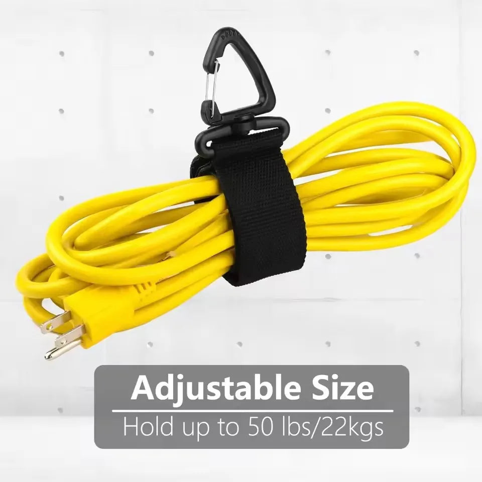 Yellow extension cord secured by a black organizer strap and hung on a wall, with adjustable size label