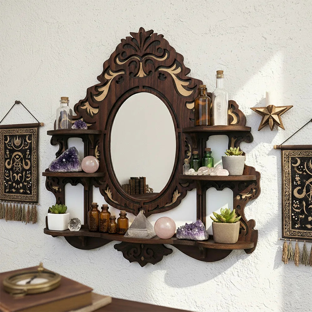 Gothic wooden mirror shelf styled with crystals and plants against a white wall
