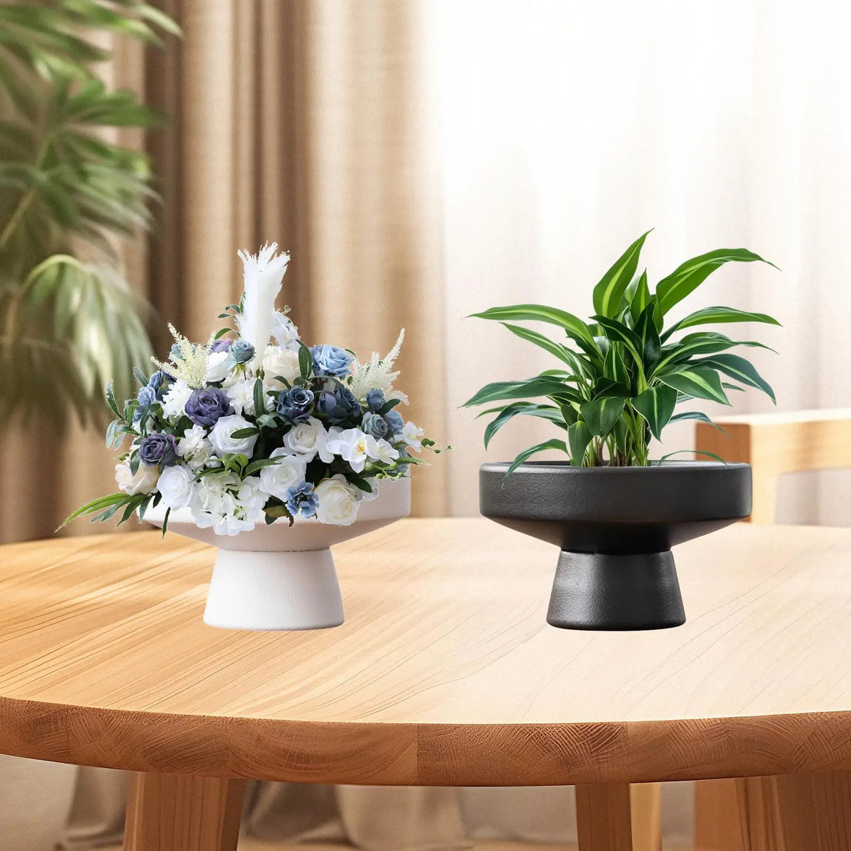 Pedestal ceramic flowerpots with flowers and plants on round wooden dining table
