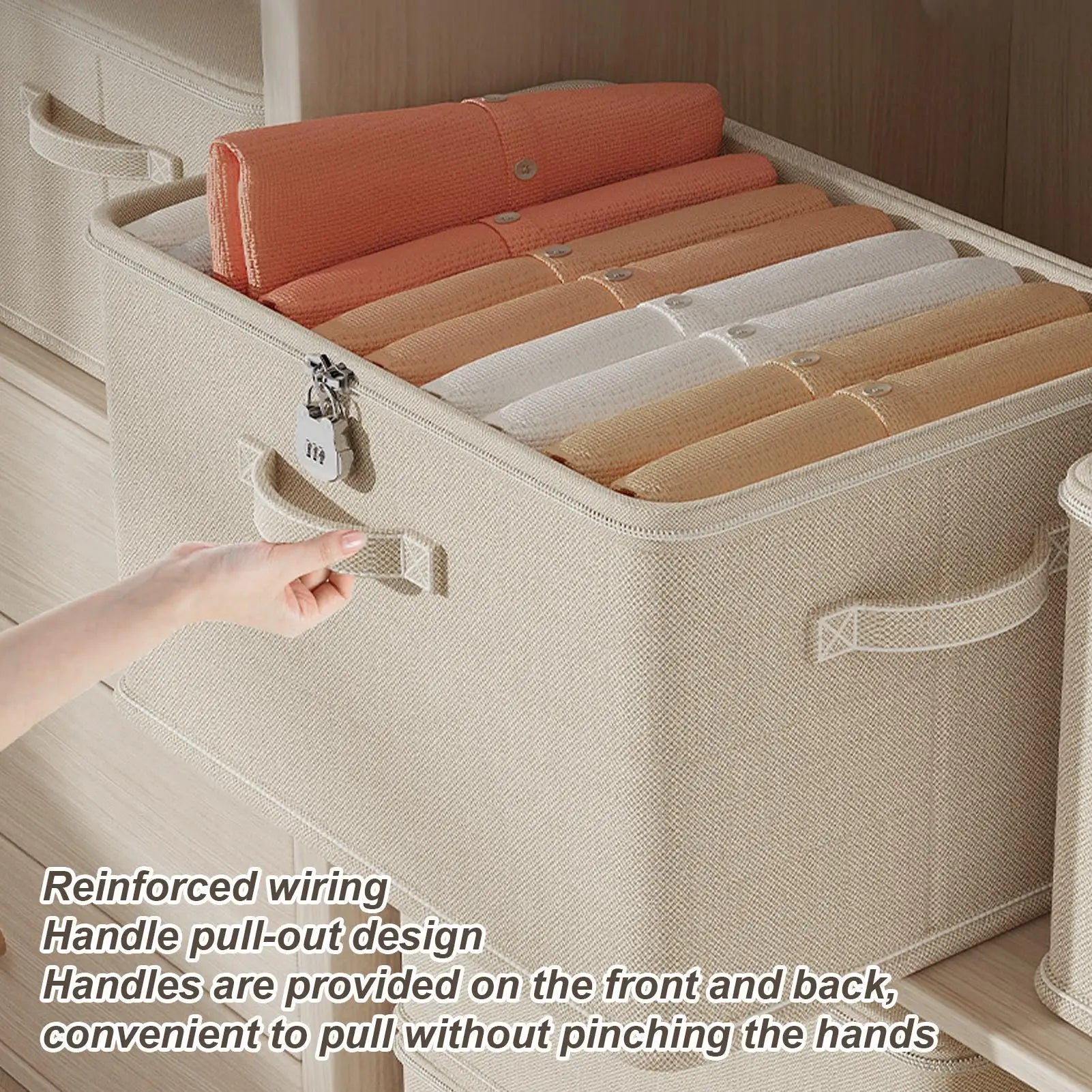 Lockable fabric storage bin with handles organized with clothing inside a closet