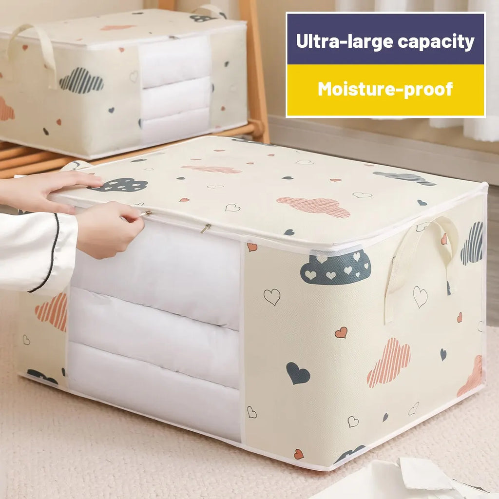 Close-up of a beige cloud print storage bag being zipped closed, highlighting the large capacity and moisture-resistant design.