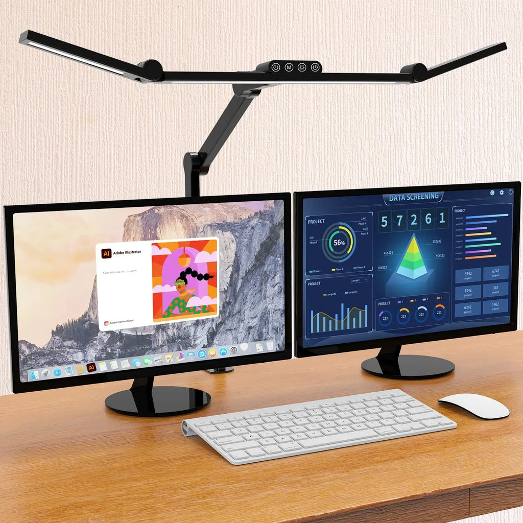 Adjustable LED clamp desk lamp mounted behind two monitors on a wood desk in a home office setting