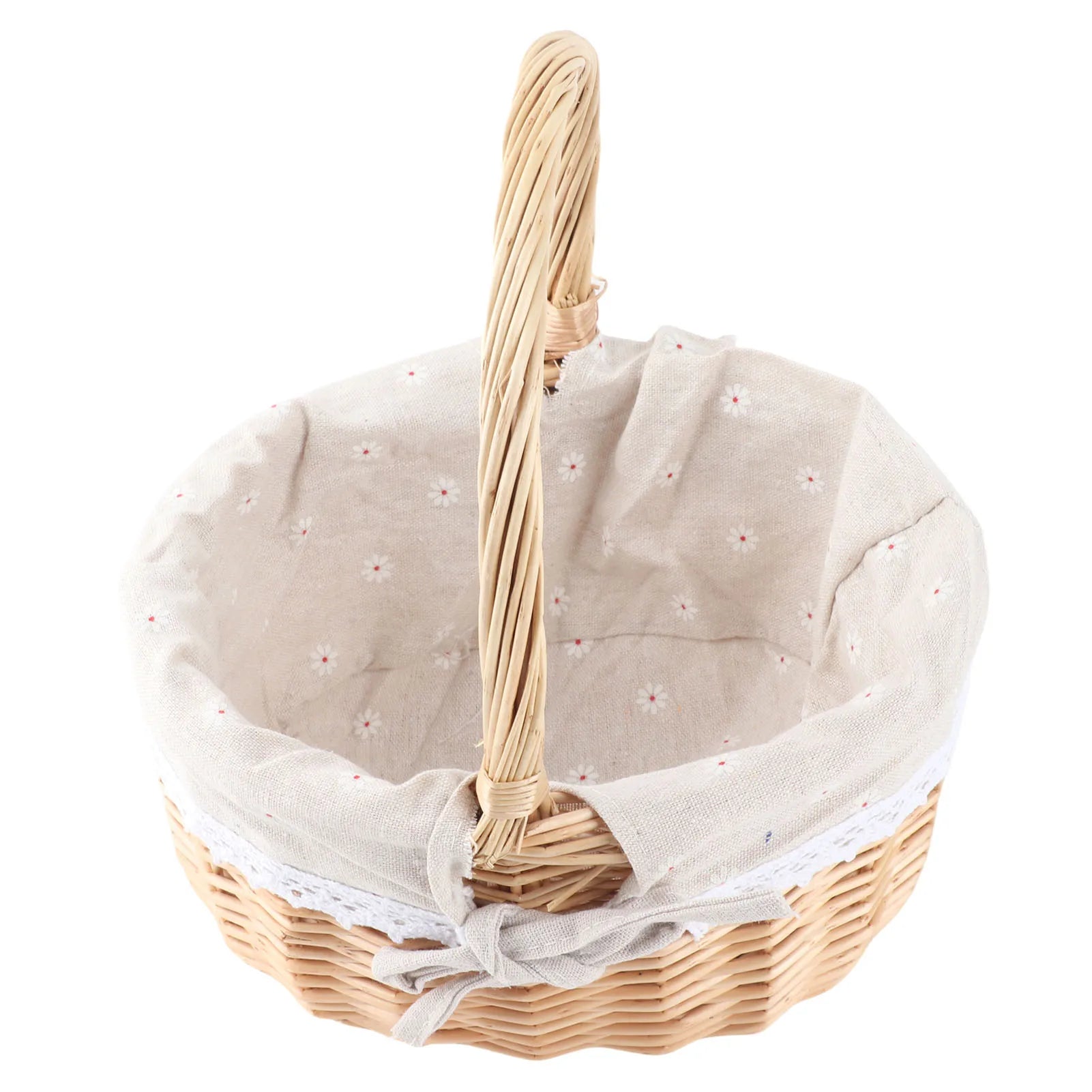 Angled view of oval rattan basket showing carry handle and bow