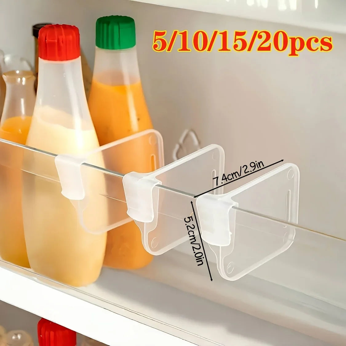 Clear plastic refrigerator shelf dividers clipped onto a fridge door shelf separating bottles