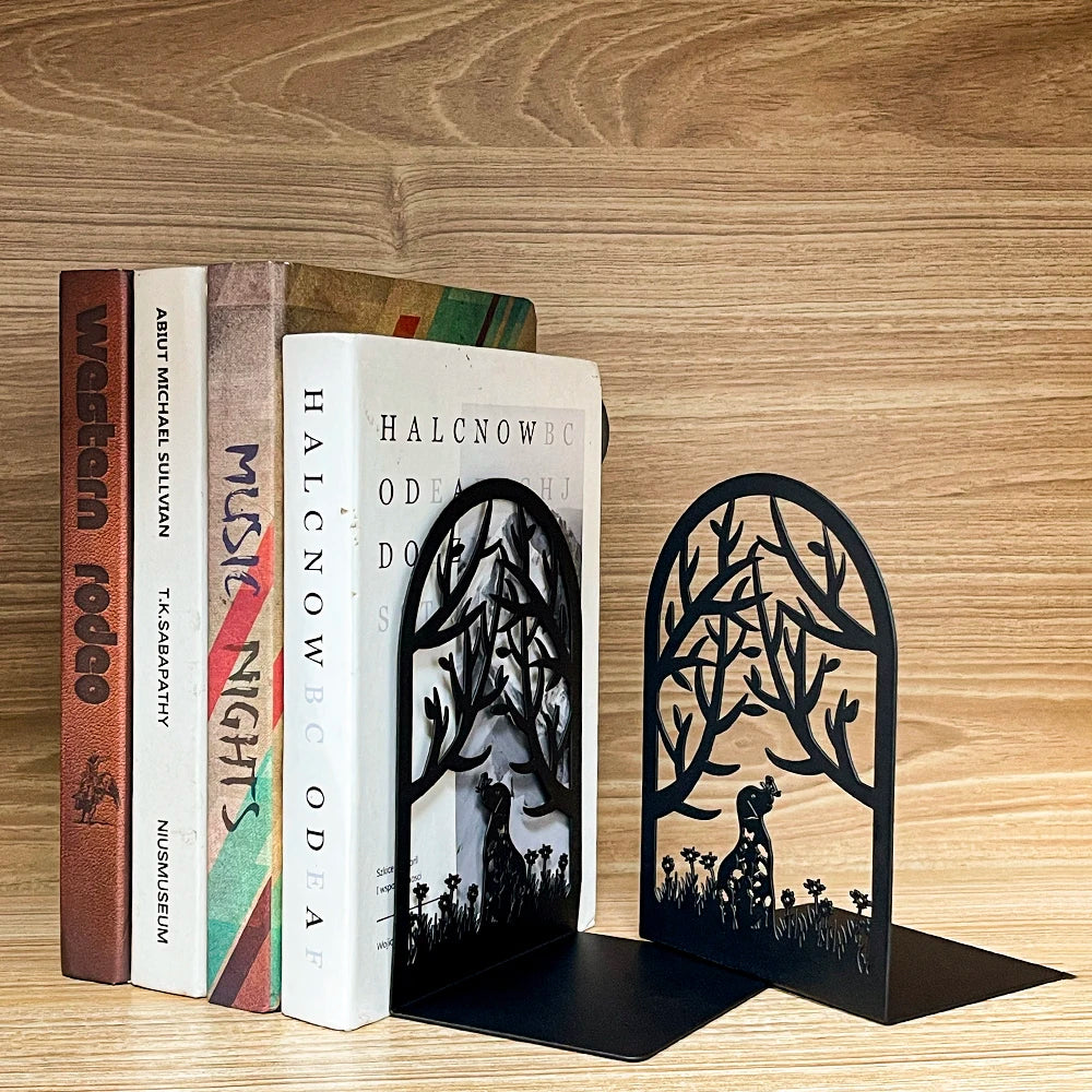 Cat silhouette metal bookends with arched woodland cut-out, shown paired together