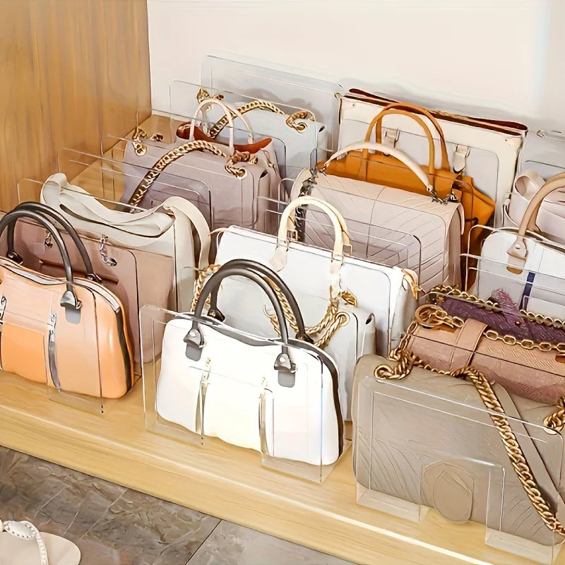 clear acrylic racks displaying purses and wallets on a shelf
