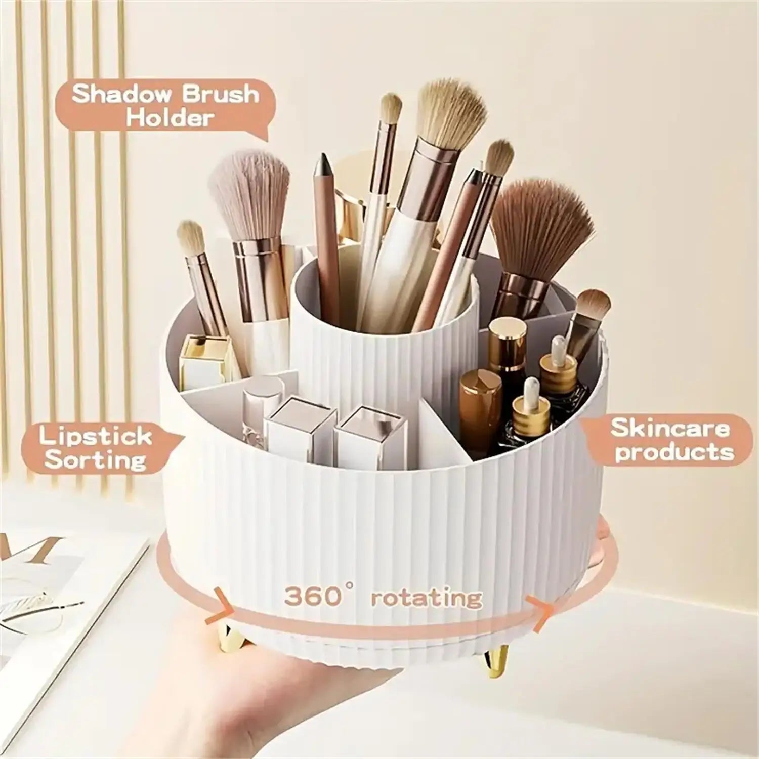 Rotating organizer in hand, showing labeled sections for makeup brushes, lipsticks, and skincare