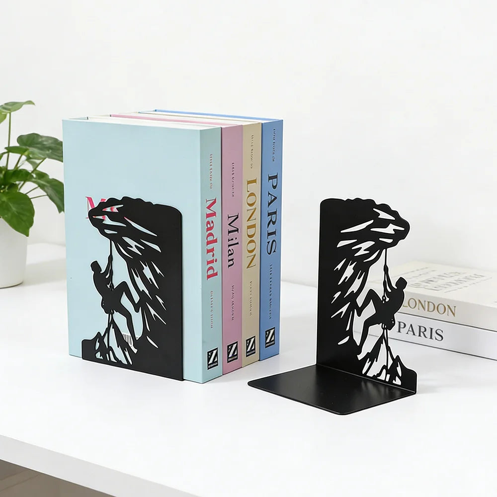 Black metal bookends with a rock climbing silhouette design organizing books on a shelf