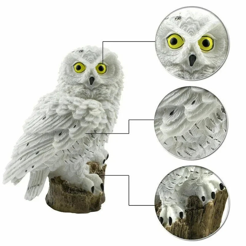Close-up details of the white owl garden lamp showing feathers and base