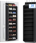 Black over-the-door shoe organizer with ten shelves, filled and empty, hanging on a white door