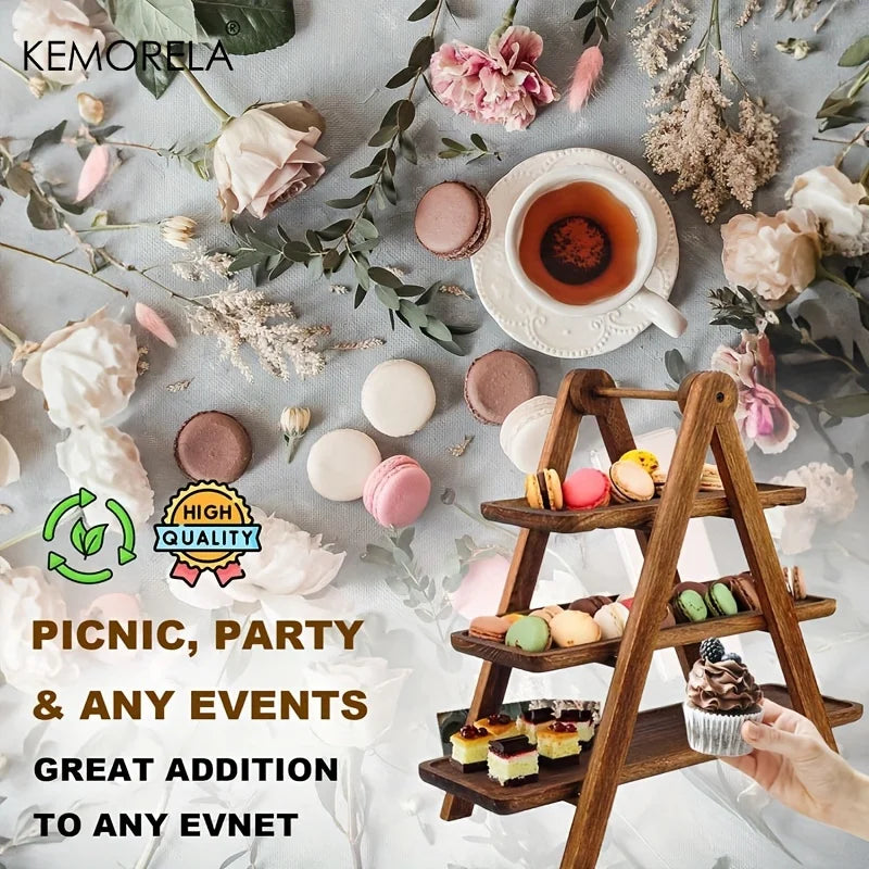 wooden tiered serving tray with pastries and macarons on a floral table setup