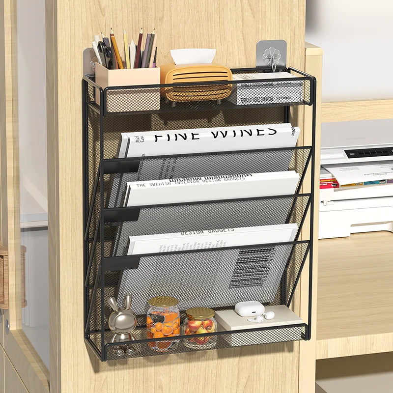 Mesh desk organizer hanging beside a desk, filled with documents and office supplies