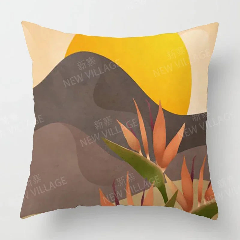 Modern abstract throw pillow cover with gray, yellow, and orange tones showing stylized leaves and a yellow sun.