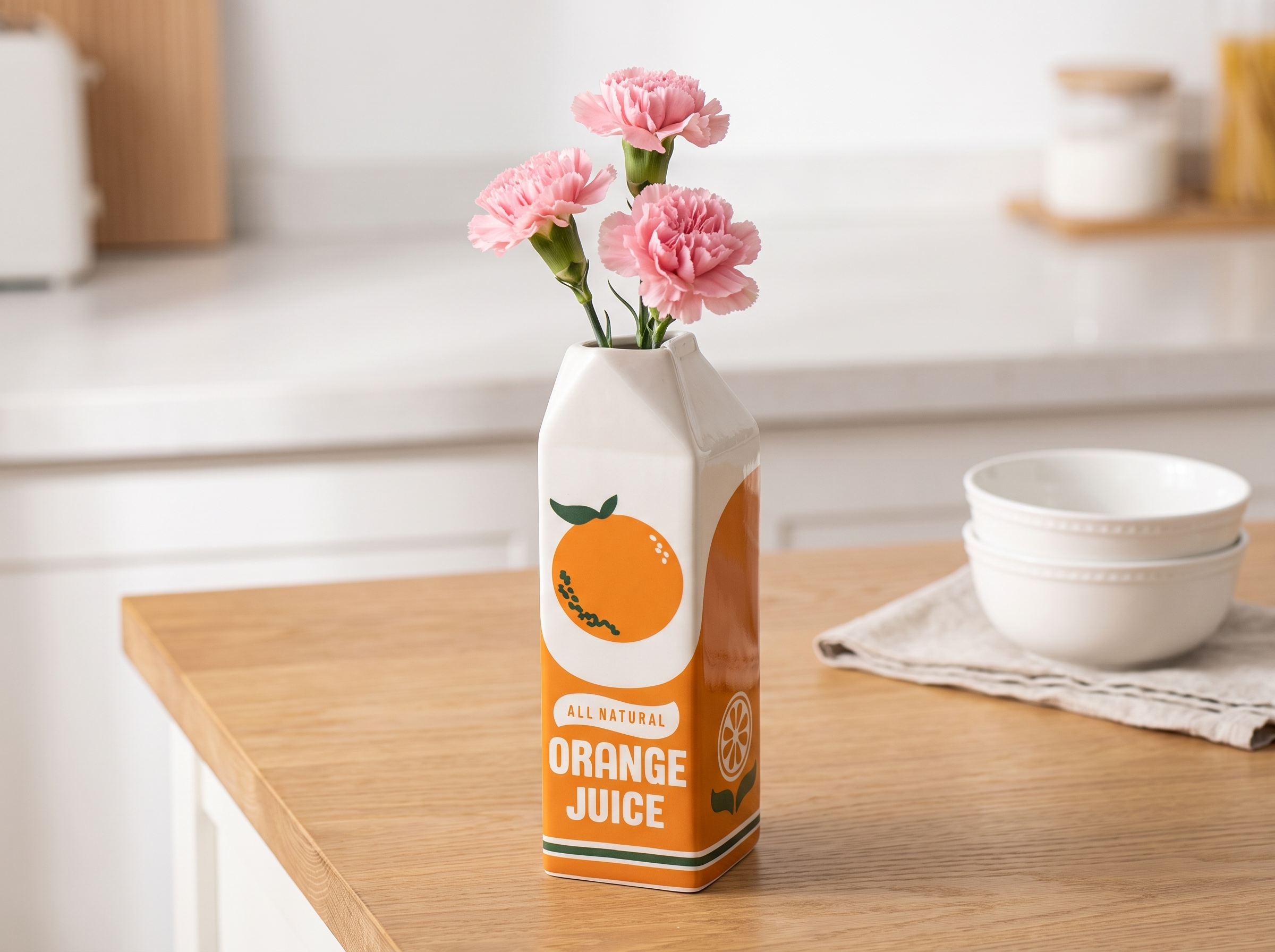 Orange Juice Carton Ceramic Vase for Playful Living Room or Kitchen Decor in a realistic home setting