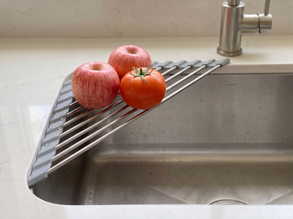 Triangular Roll-Up Sink Drying Rack for Kitchen Corners in a realistic home setting