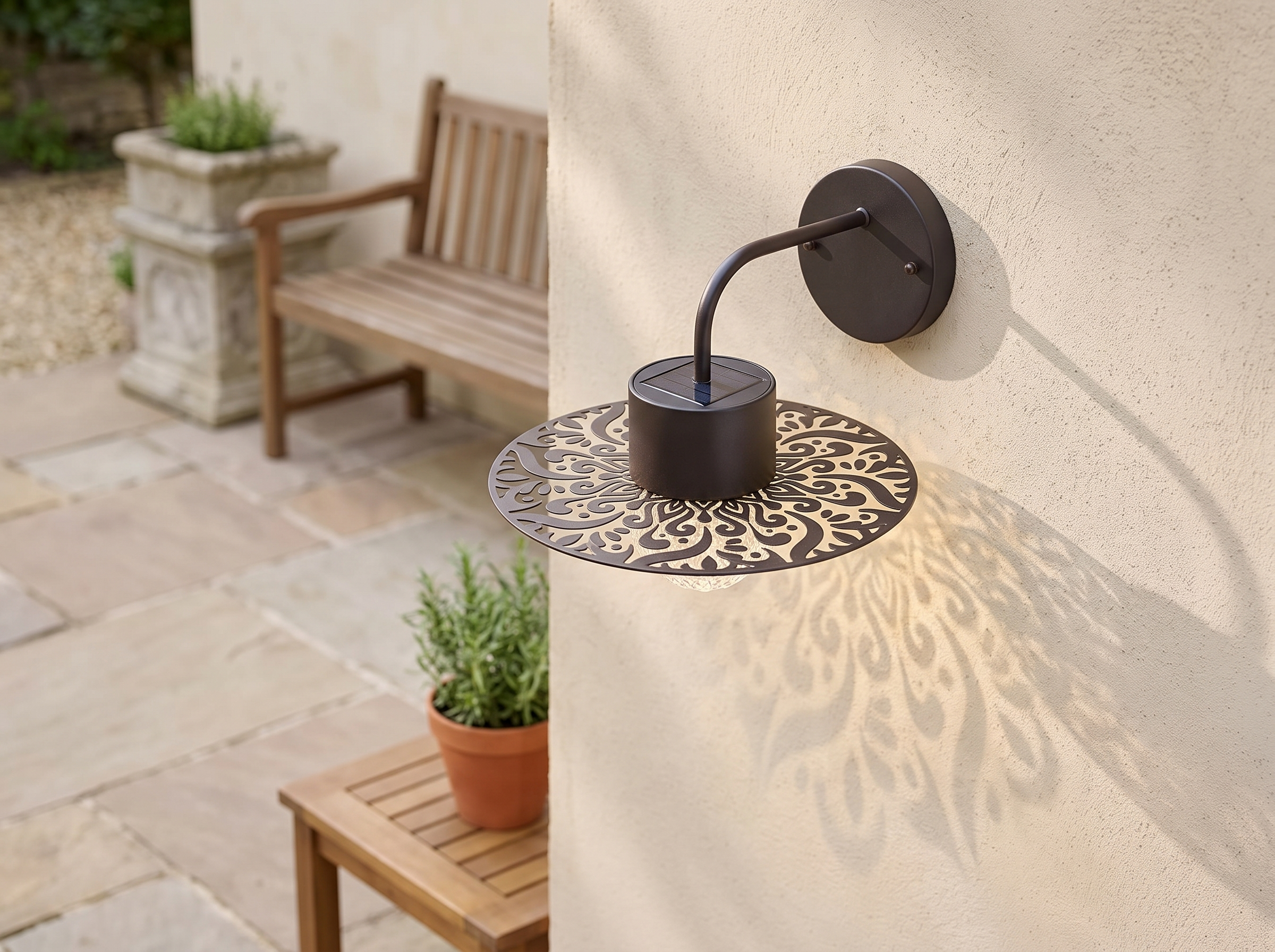 Solar Mandala Wall Lantern for Outdoor Garden and Patio Decor in a realistic home setting